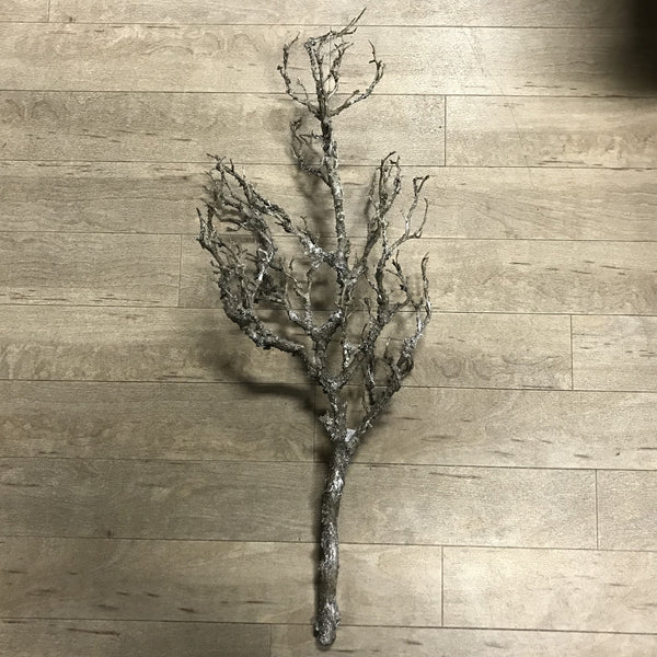 Trädgren i konstmaterial